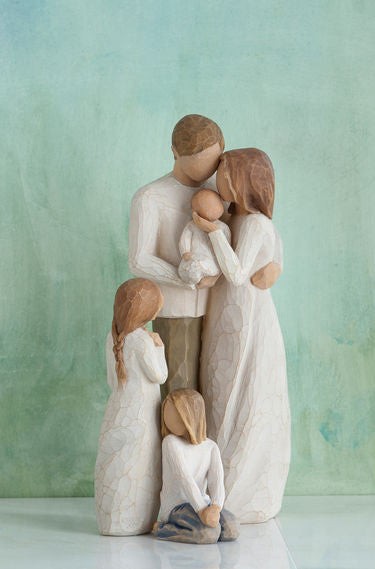 Parents with 3 children, 2 girls and baby