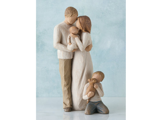 Parents with 2 children, 1 Boy, baby and dog
