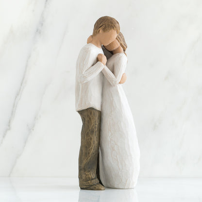 Side view of Willow Tree Promise couple figurine embracing